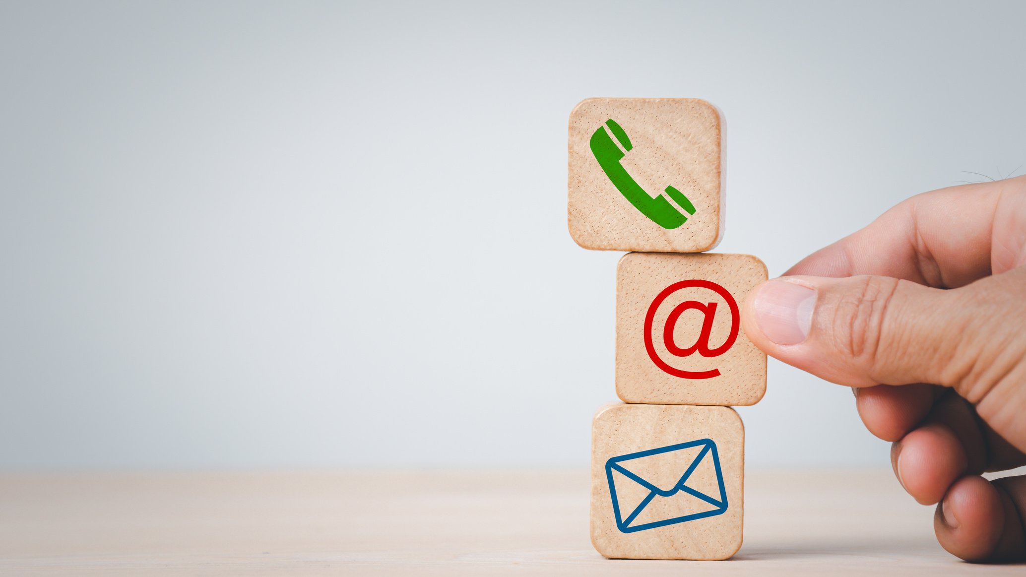 Wooden Block Cubes in Hand with Copy Space